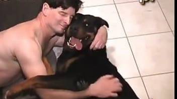 Adult man sucking off a big dick to his dog