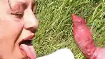 ?Freaky young brunette bitch nastily sucking her male animal dog pets dick outdoors