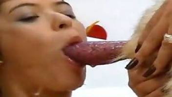 Woman fucking a dog and swallowing cum